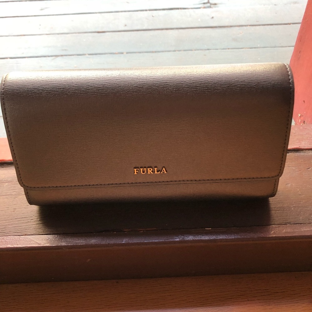 NWOT beautiful Furla clutch.